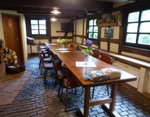 Das gemütliche Kaminzimmer der Holmer Mühle. Foto: ein
